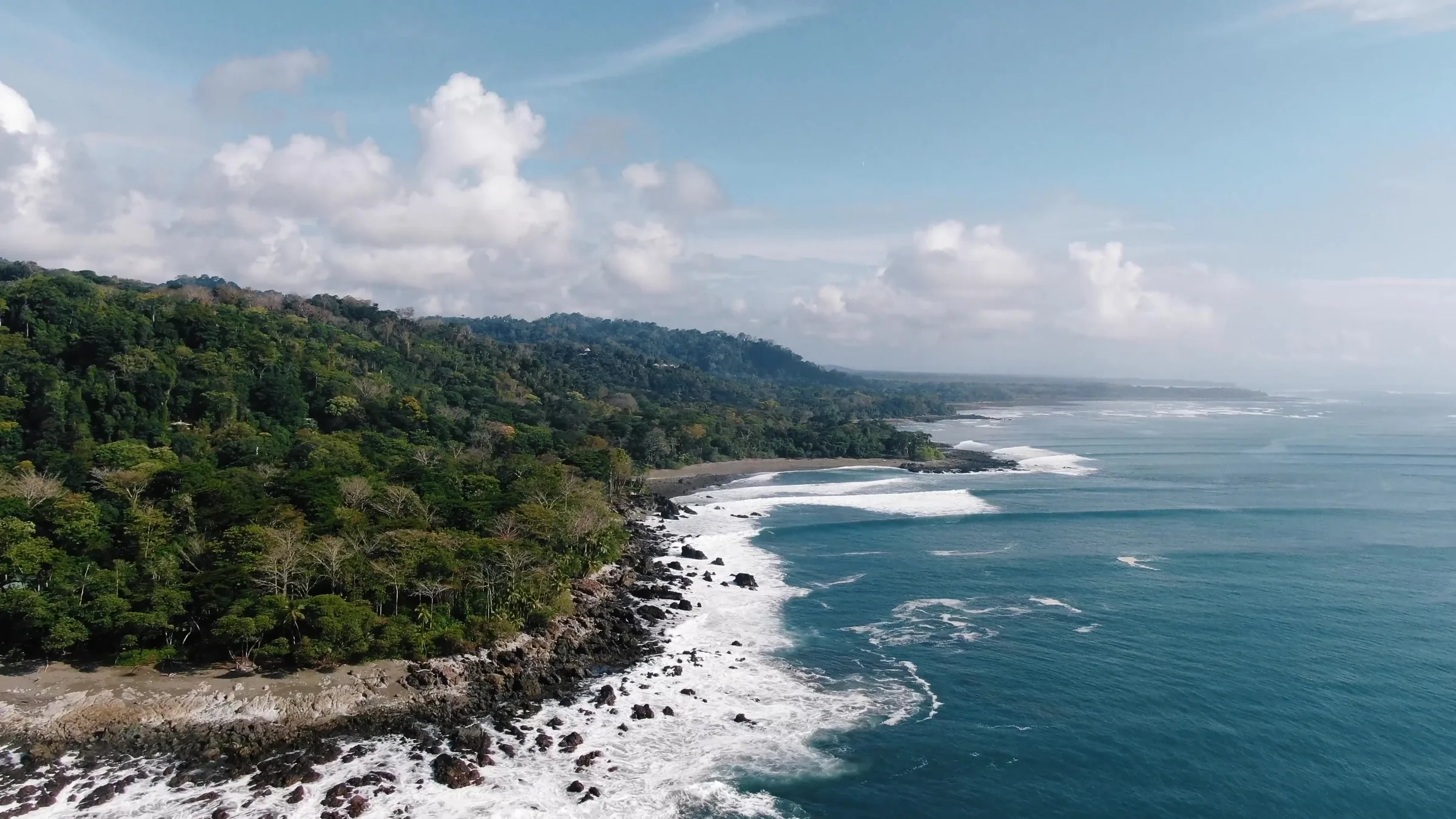The Osa coast from above: rainforest meeting the surf at Cabo Matapalo.